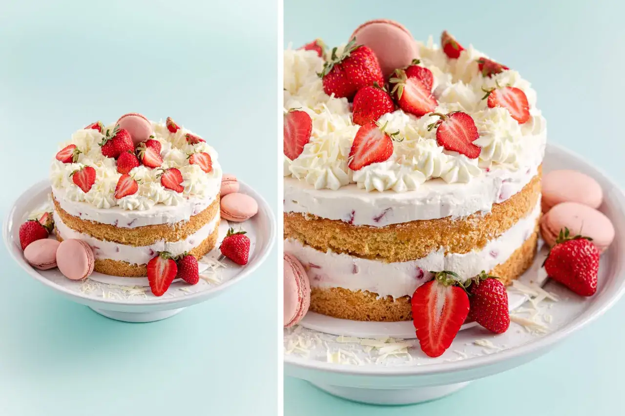 Eine köstliche Erdbeer Schoko Torte, dekoriert mit frischen Erdbeeren, Schlagsahne und rosa Macarons.